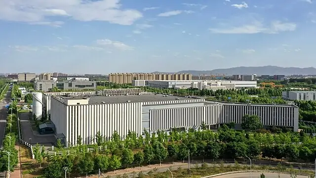 Exterior of a large data centre complex housing energy-intensive computing infrastructure