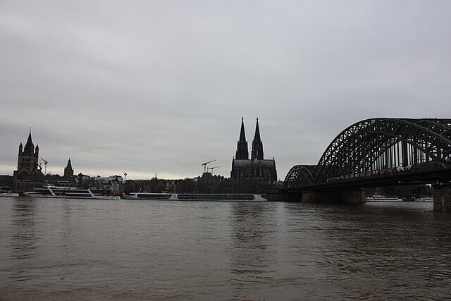 The River Rhine flowing through Europe, a major waterway carrying pollution and litter toward the North Sea.