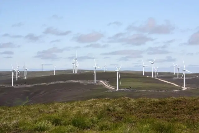 Onshore wind turbines generating renewable energy in the UK countryside