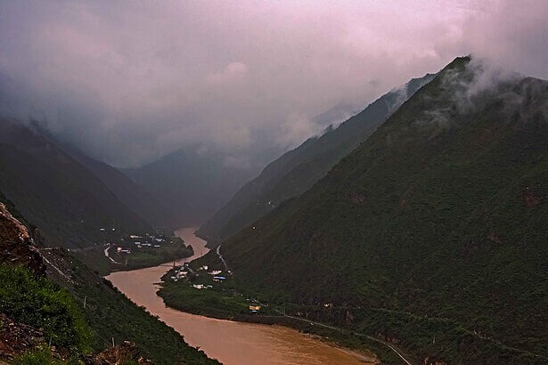 Upper Yangtze River flowing through mountainous landscape in China, showing natural freshwater ecosystem recovery