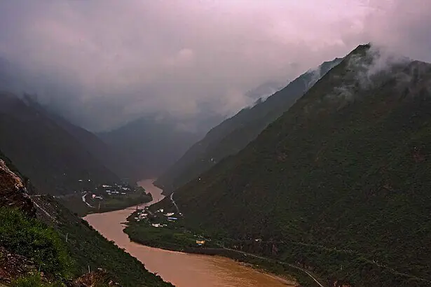Upper Yangtze River flowing through mountainous landscape in China, showing natural freshwater ecosystem recovery