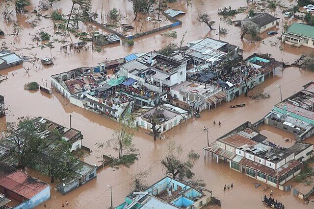 Flooding in Mozambique caused by extreme weather linked to climate change, affecting homes, farmland and food security.