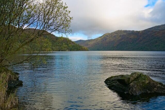 Litter and waste concerns near roadside areas around tourist destination Loch Lomond showing natural scenery in western Scotland