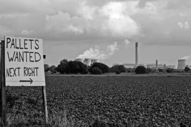 Drax biomass power station in Yorkshire with cooling towers releasing steam into the sky