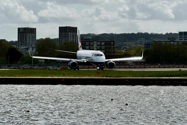 Aeroplane at London City Airport highlighting aviation and carbon emissions