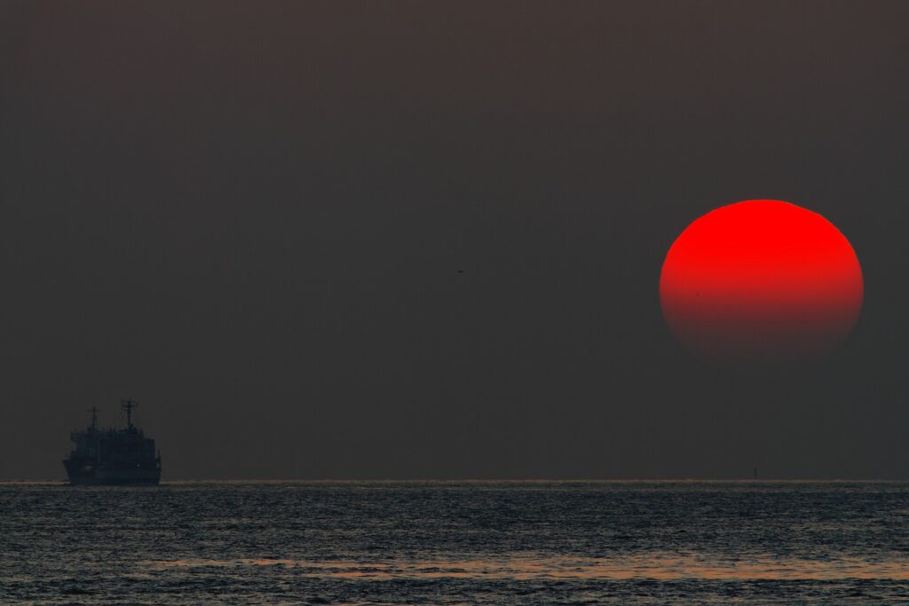 Sunset over the ocean as global sea temperatures reach record highs