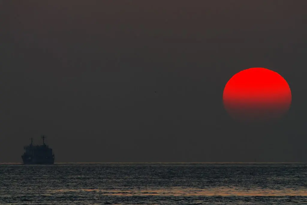 Sunset over the ocean as global sea temperatures reach record highs