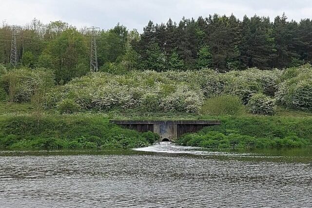 Sewage outfall discharging wastewater into an English river