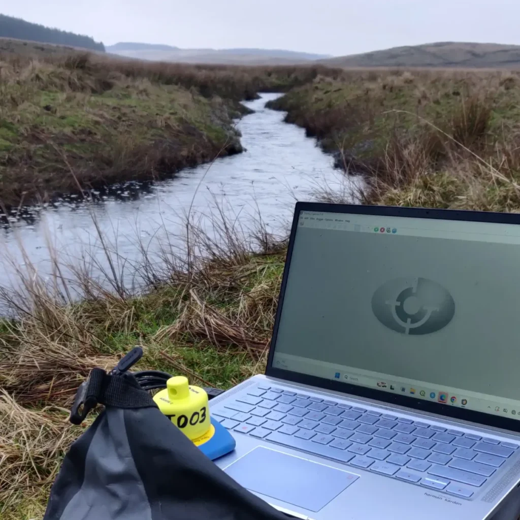 Working riverside in river habitat monitoring pilot.